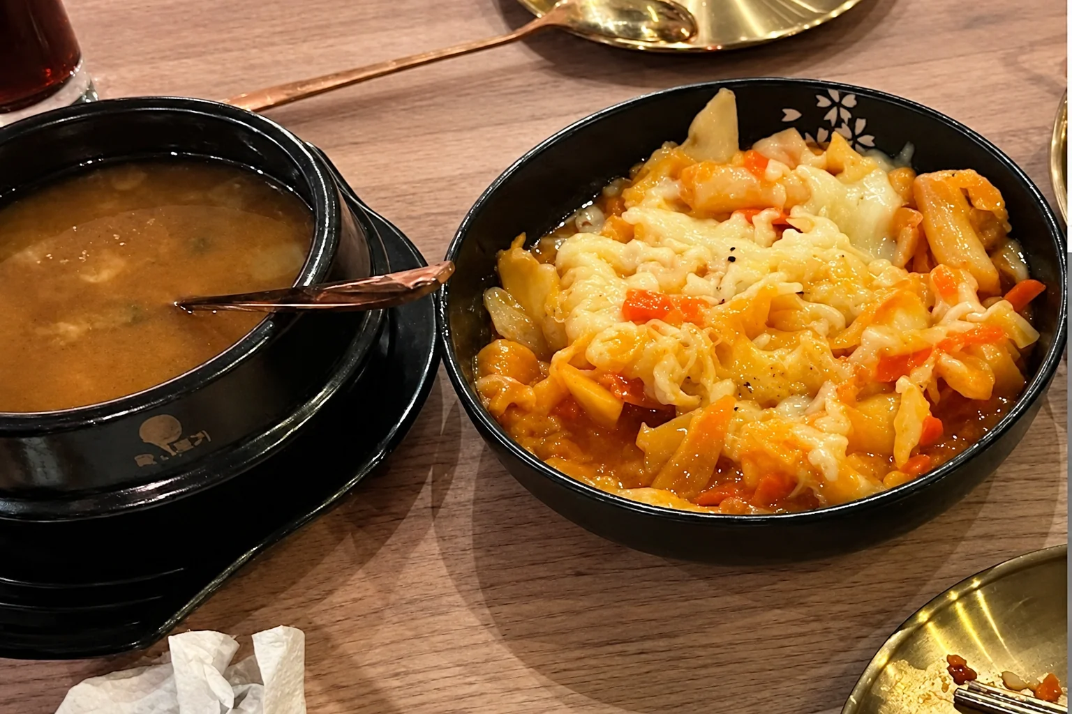 Dish in a black bowl on a wooden table